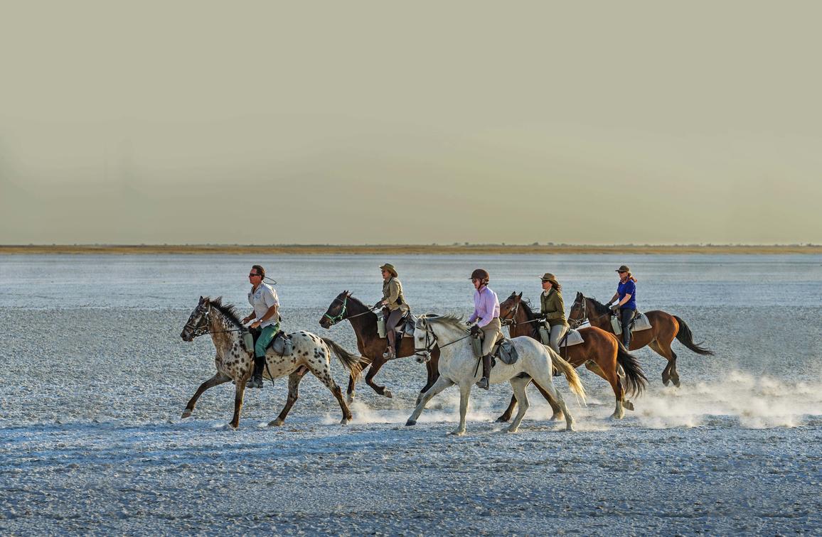 Horseback riding across the vast Makgadikgadi Salt Pans from Jack's Camp.