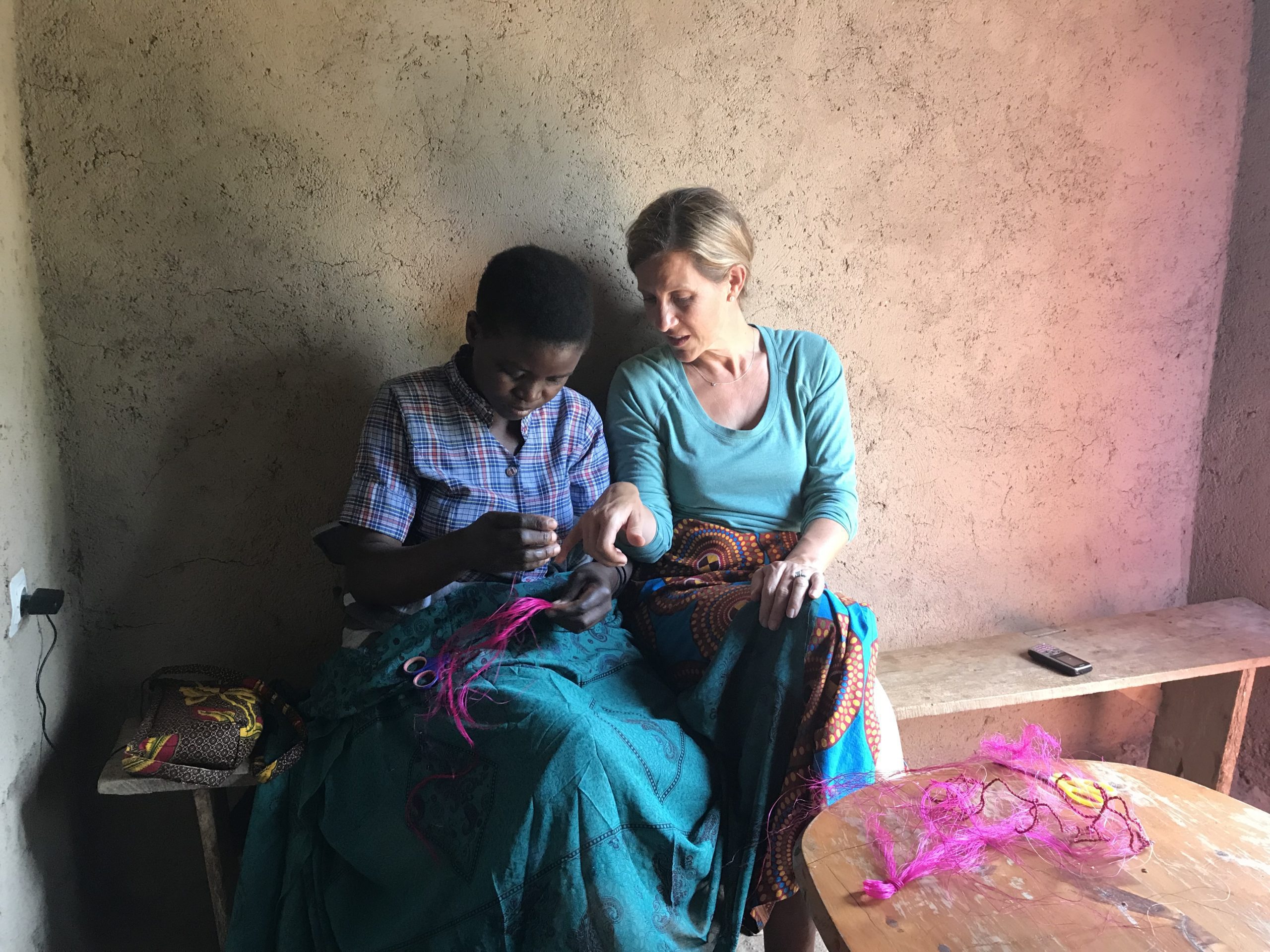 Lara Ray learning to weave during Azizi Life day