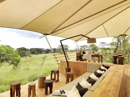 chairs in the main lounge area of Serengeti Bushtops on Pan-African safari