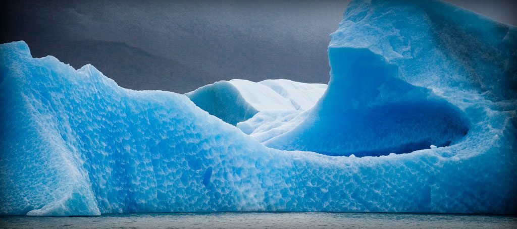 blue glacier seen on a safari in the Americas