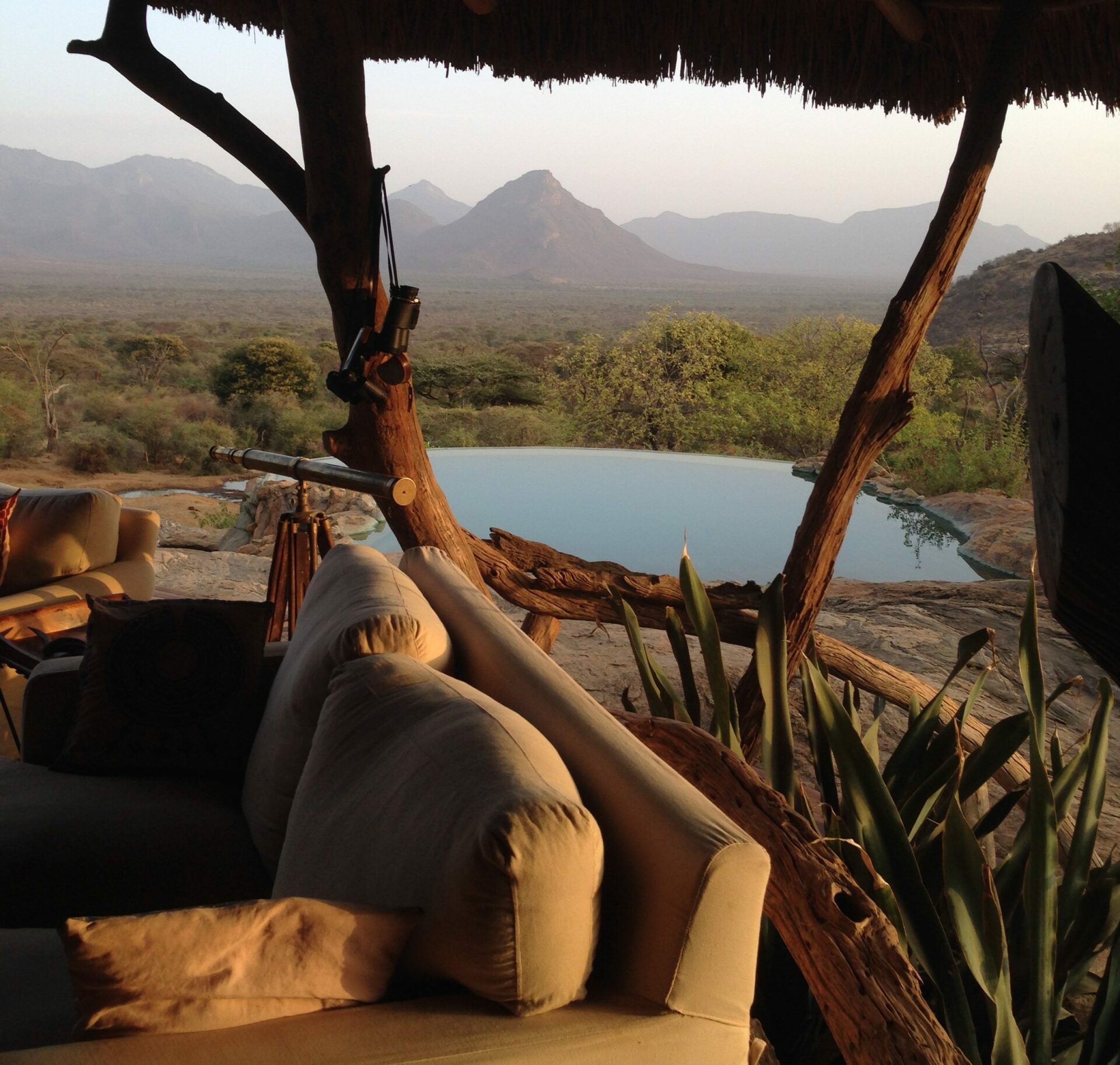 main area lounge view overlooking the pool and hills beyond at sarara camp on Kenya safari