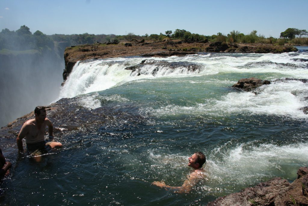 Victoria Falls: Where to Stay in Livingstone, People Swinning