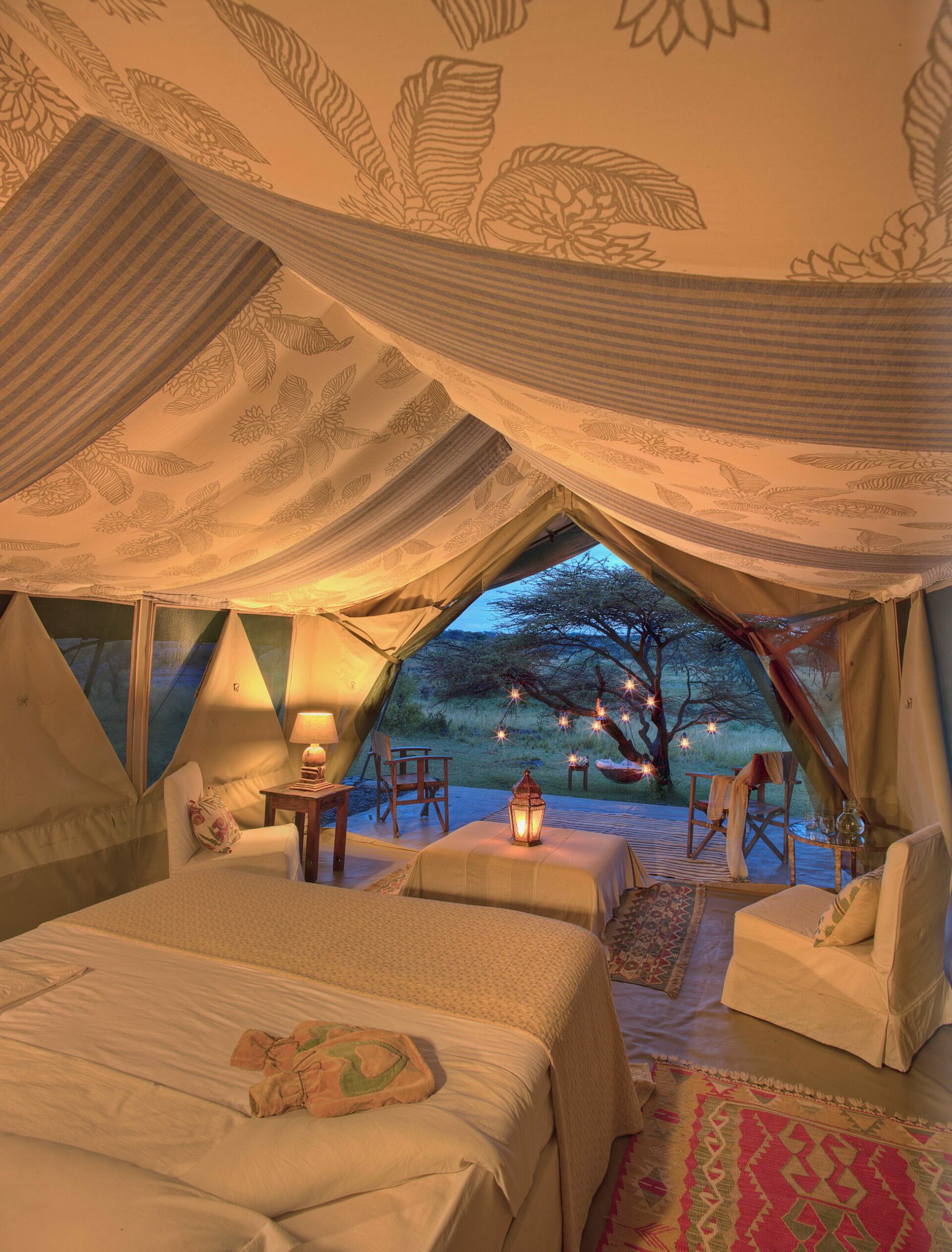 lovely white interior decor of a RIchard's River Camp tented room