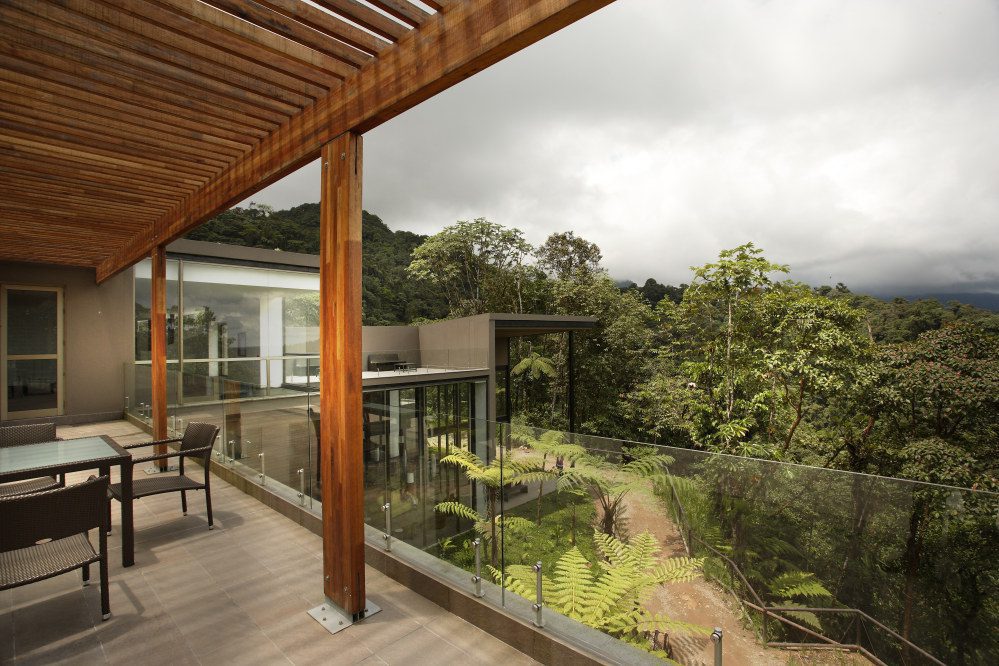deck looking out to forest at Mashpi Lodge on safari in Ecuador