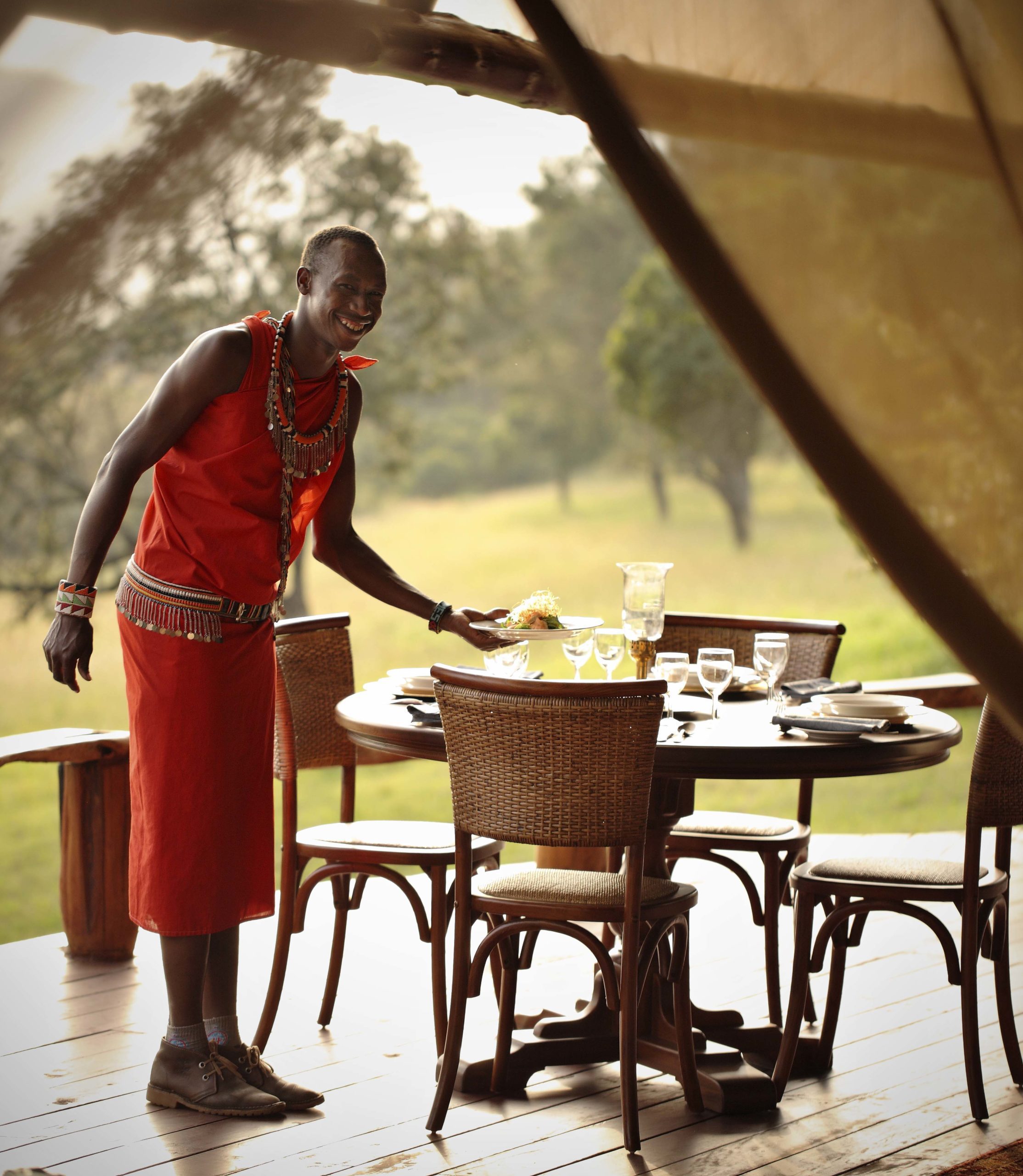 Samburu tribesman delivering breakfast on the best kenya safari