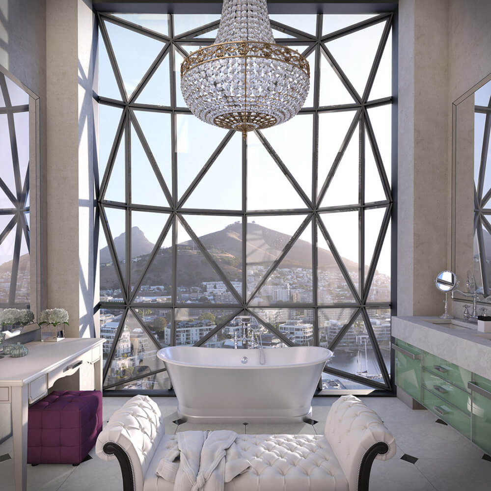 bathtub in front of glass windows with mountain in background