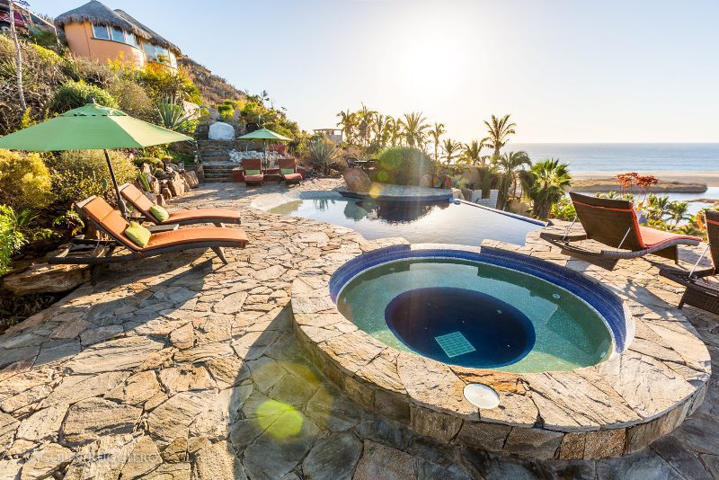 lush landscape and pool at resort on mexico safari