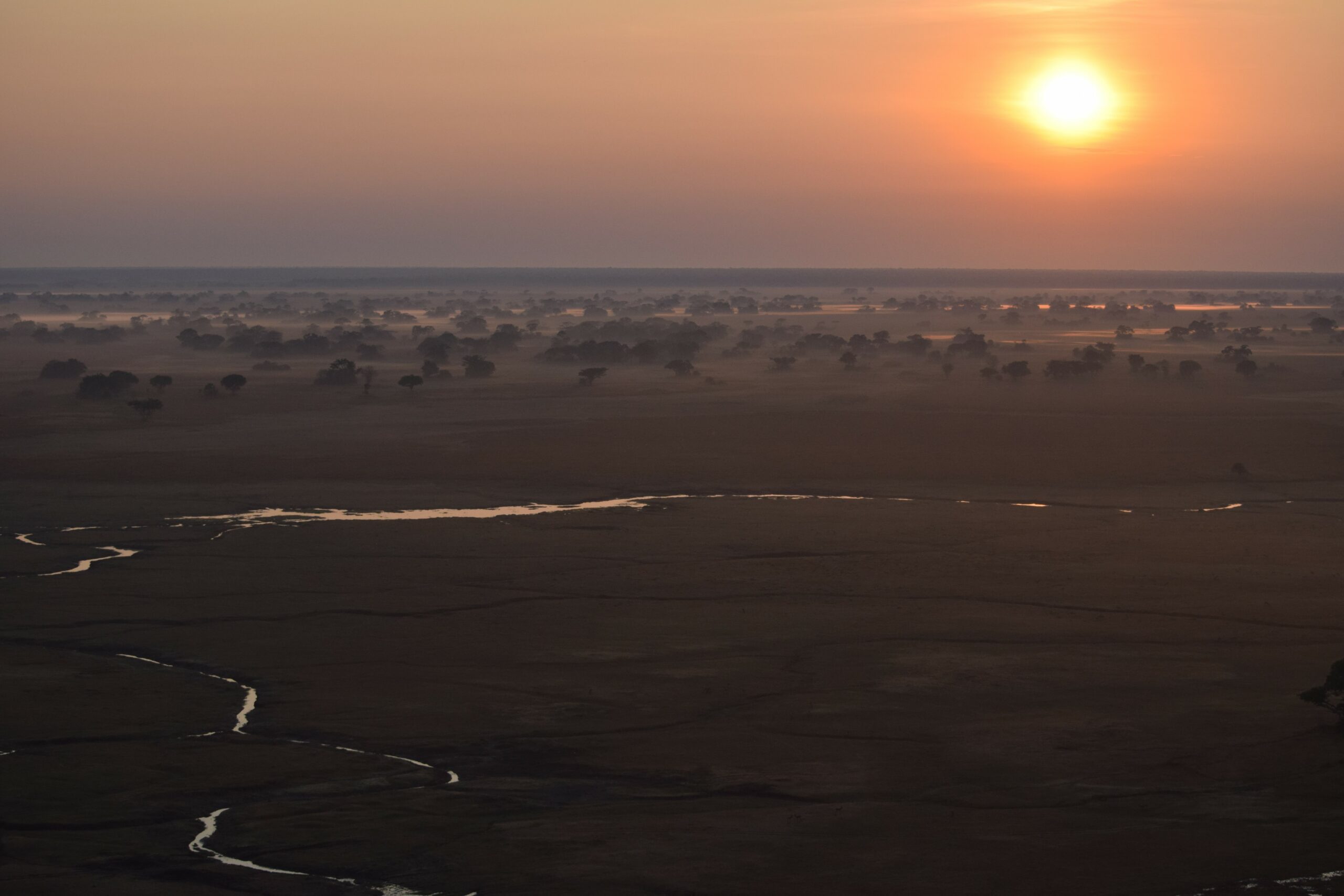 Sun setting on the Zambia plains