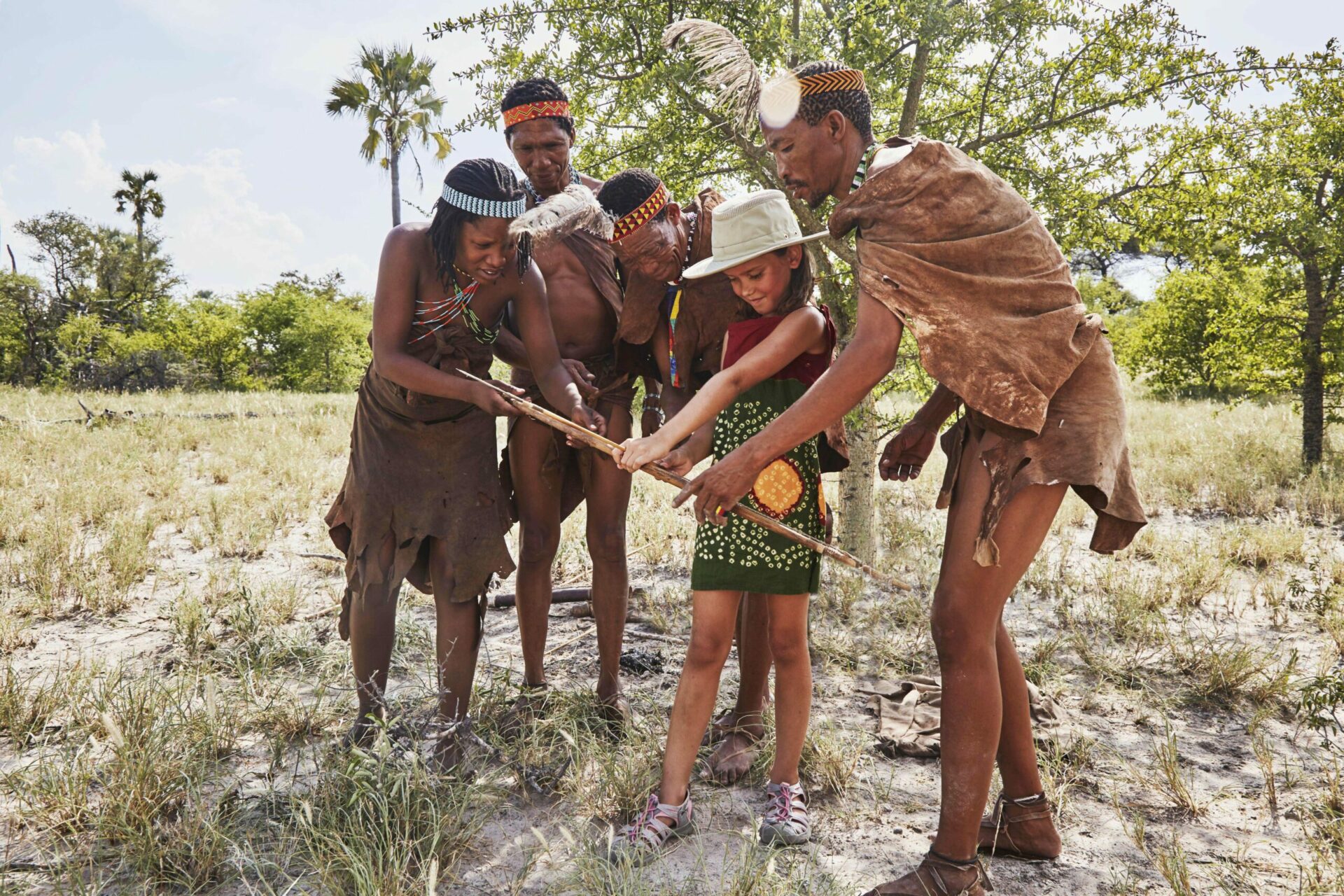 child with San bushmen in the Kalahari