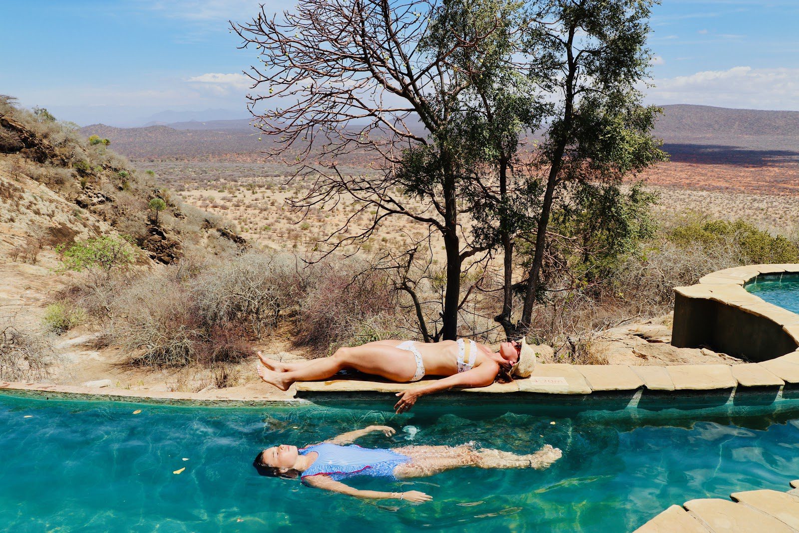 This Family's Amazing Safari Will Make You Want to Plan Your Own, Relaxing at the pool