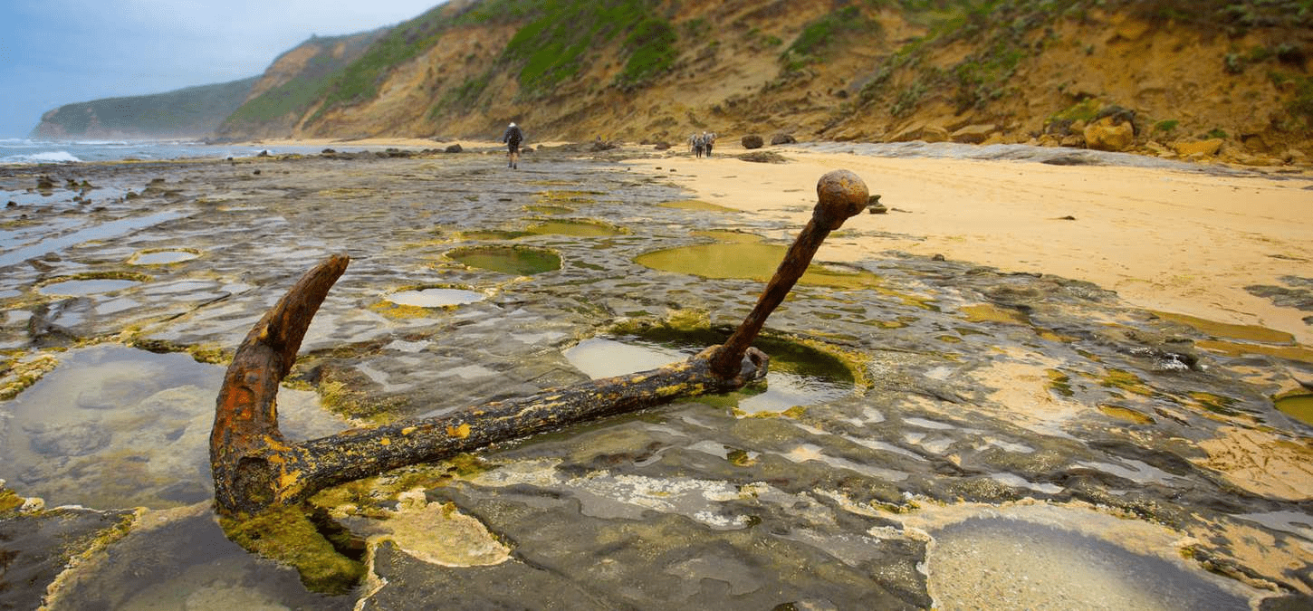 Rusty anchor on a wild beach in Victoria, Australia in Tasmania