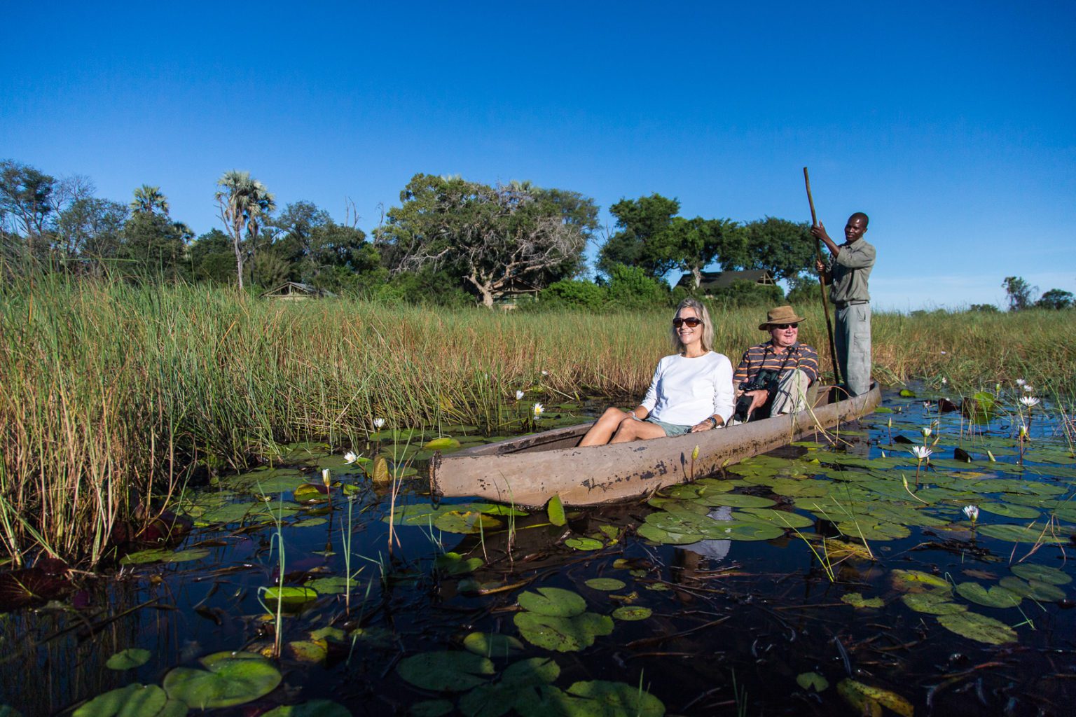 Seba Camp guests on a water safari with guide botswana on our off-grid Botswana safari