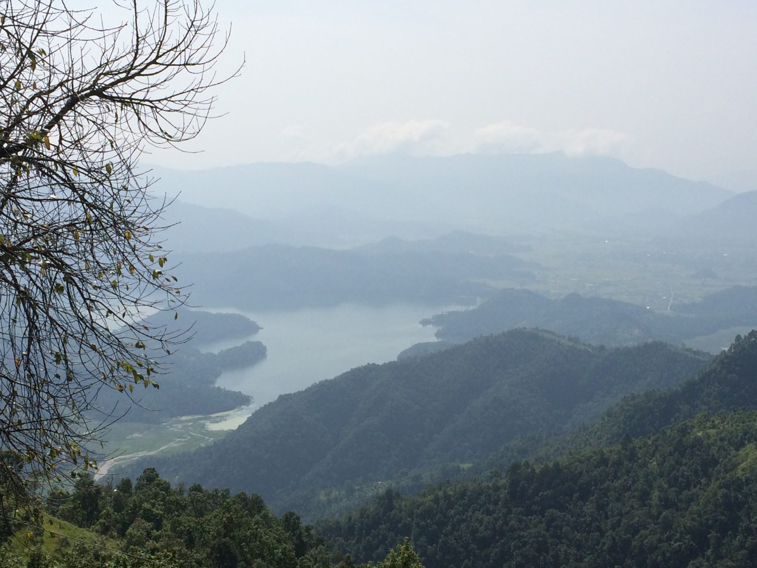 Phewa Lake from atop a hill with mountains in the distance, Pokhara Nepal