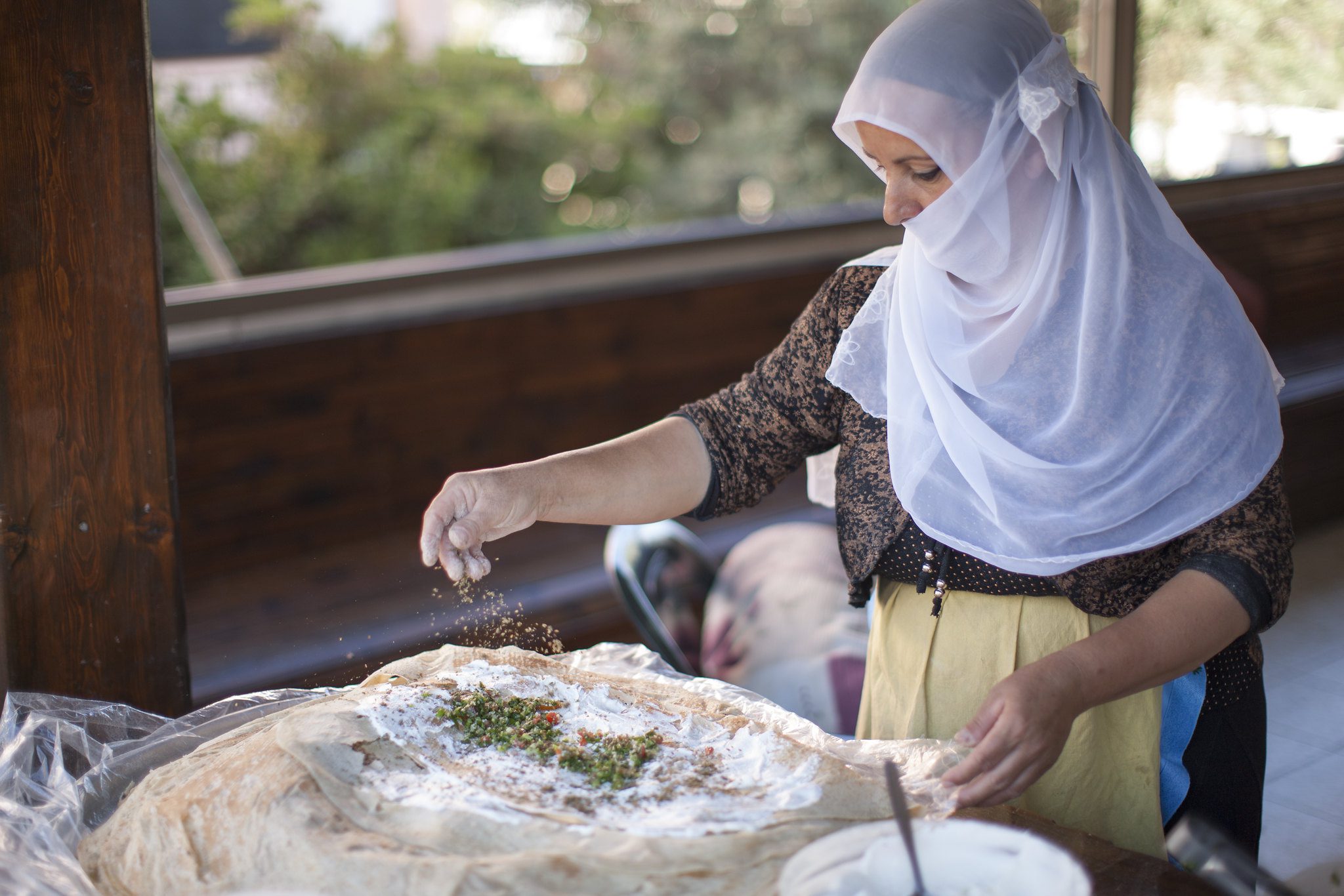Druze woman preparing traditional food