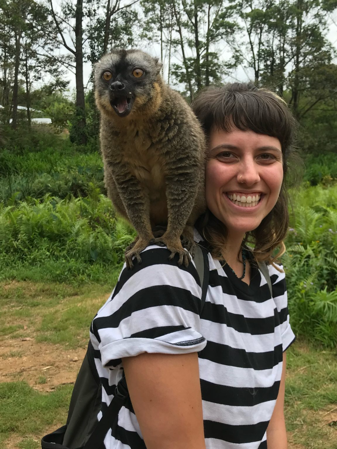 Dania with Lemur on shoulder on Lemur Island