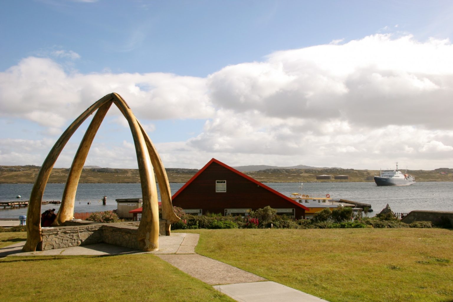 Whalebone Arch at the edge of the waters in Port Stanley on the Falkland Islands