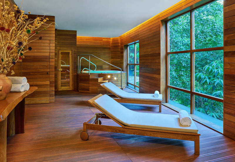 Spa with two lounge chairs and Jacuzzi