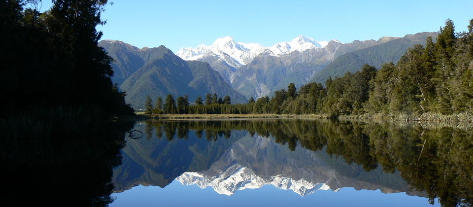 mountains reflected on lake Matheson