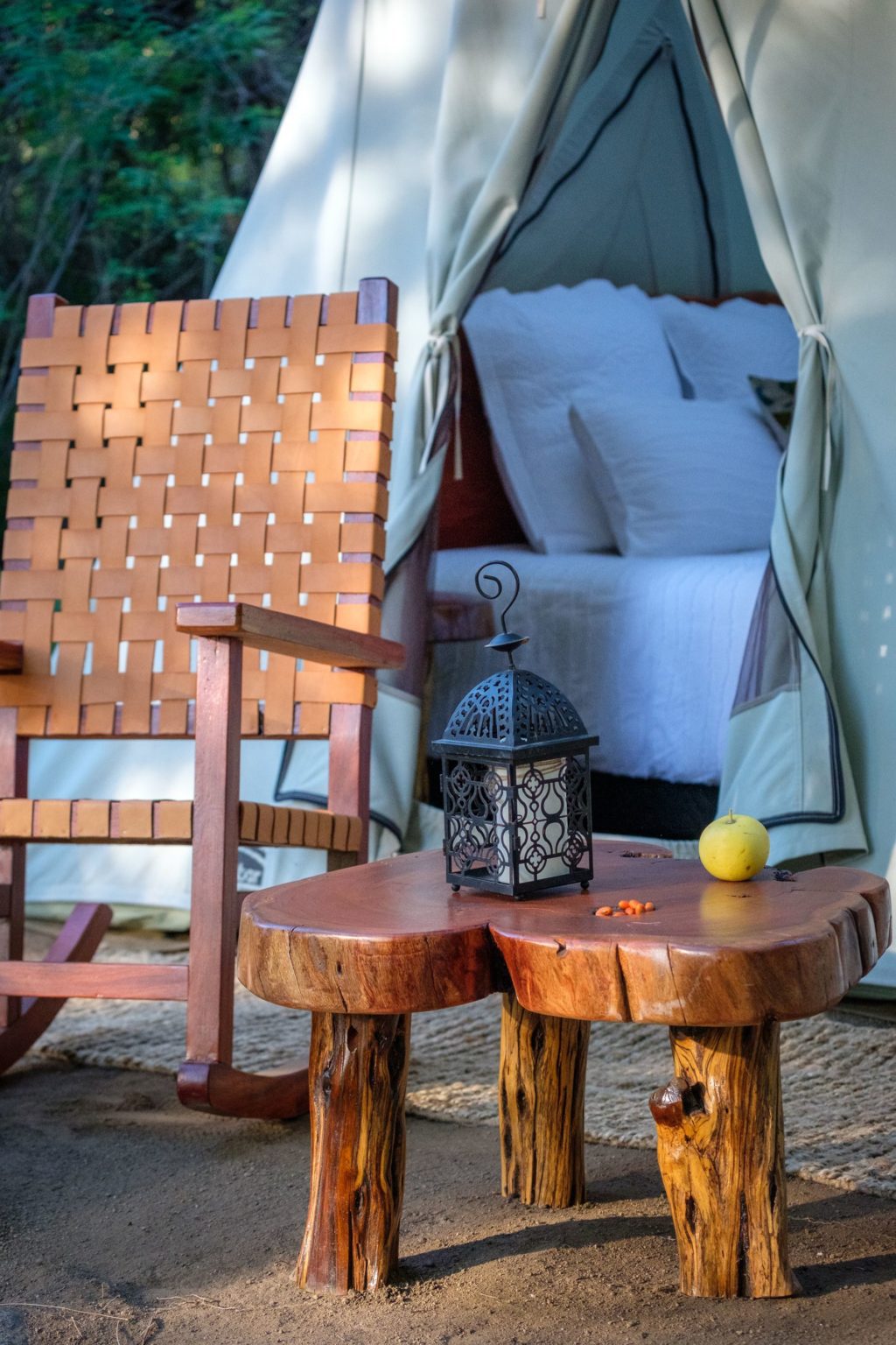 comfortable rocking chair set up outside luxury tent