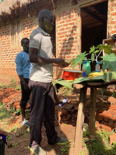 learning how banana beer is made in Uganda