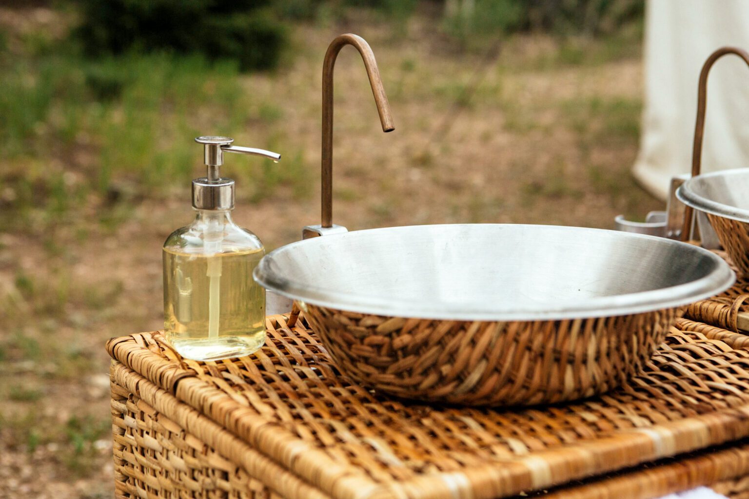 stainless steel sink basin with soap in a field