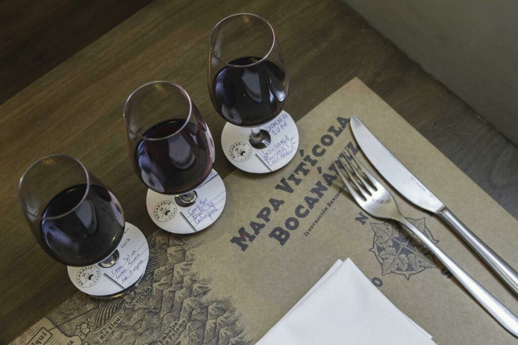 Three wine glasses setup for a wine tasting at Bocanariz wine bar.