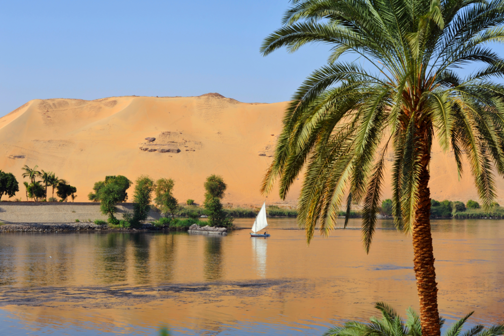 Views along the Nile from a river cruise passing through Aswan, Egypt. Image courtesy of Getty Images