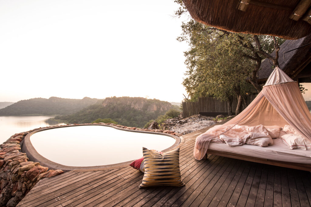 Singita Pamushana’s star bed is seated on a secluded platform overlooking Malilangwe Dam.