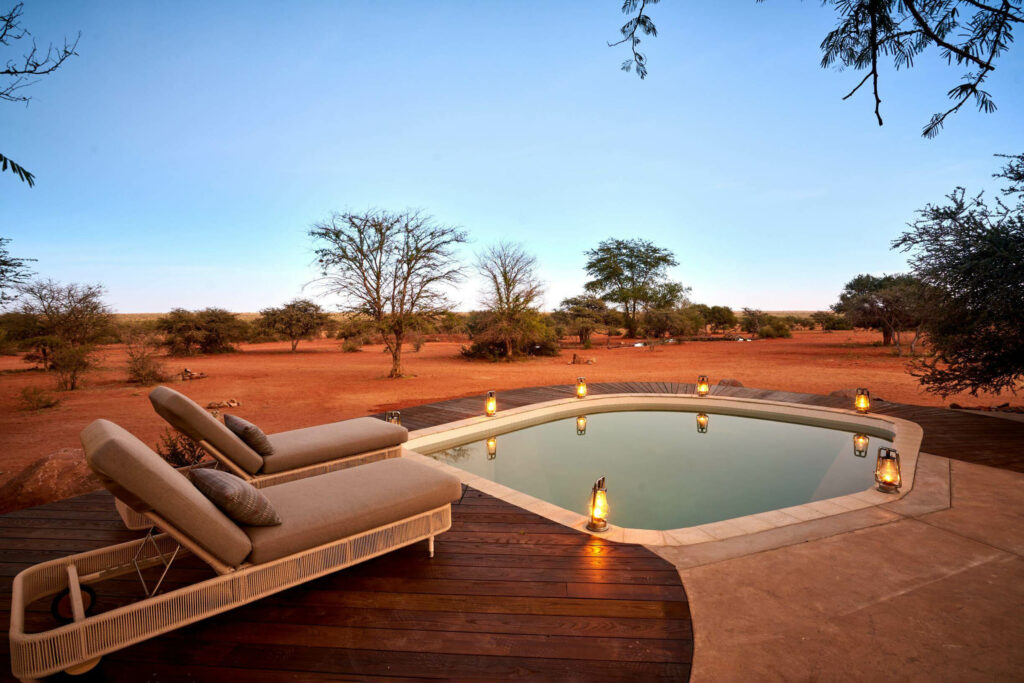 The deck and pool overlooking arid desert at Tswalu Kalahari, Southern Kalahari