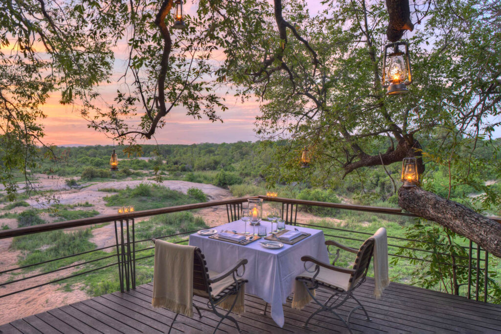 Romantic dinner on the deck overlooking the bush at Sabi Sand Leadwood Lodge