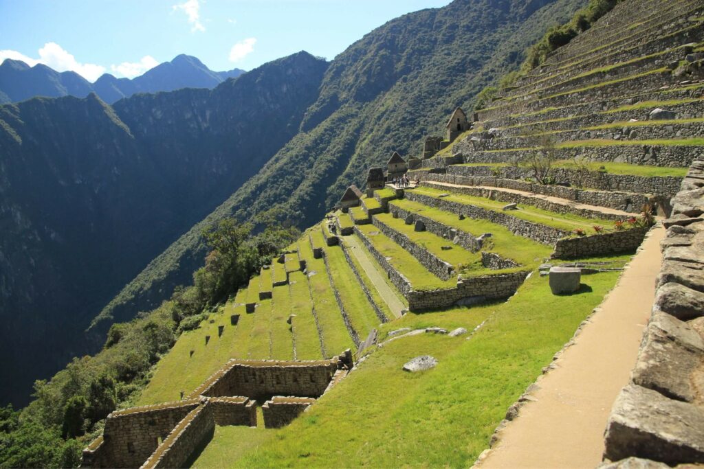 stepped ruins on the side of the mountain machu picchu