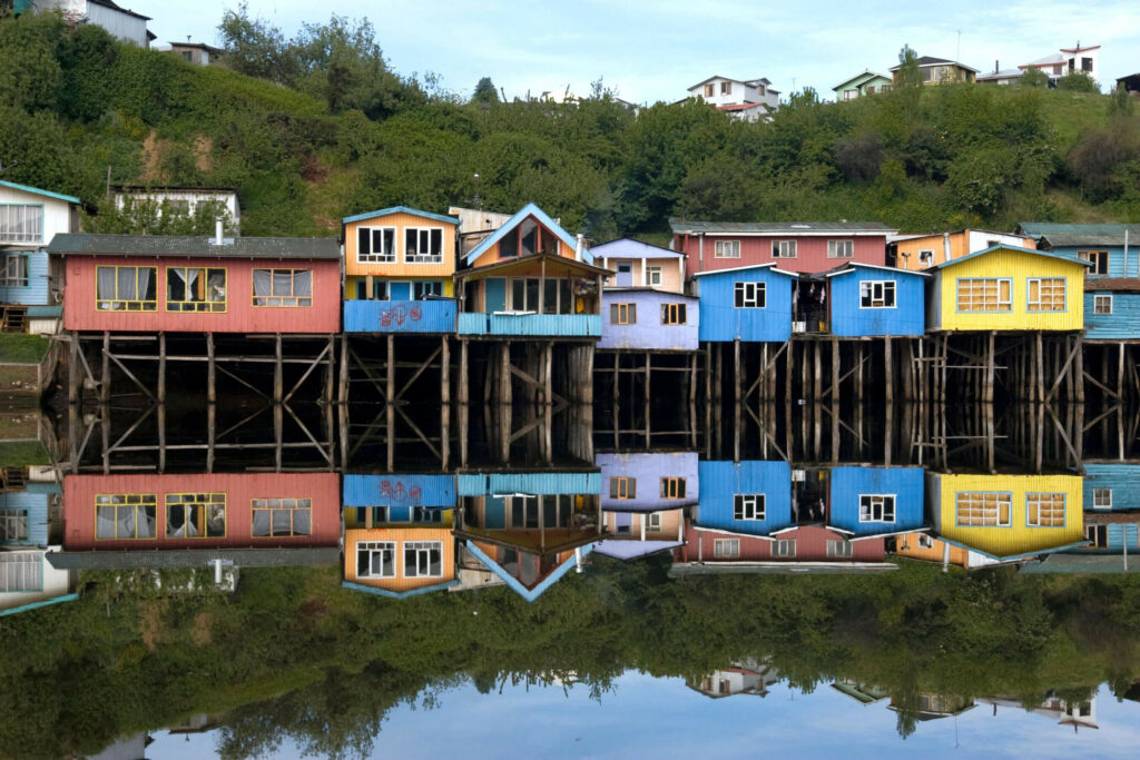 Candy-colored stilted palafitos (houses) on Chiloé Island. 