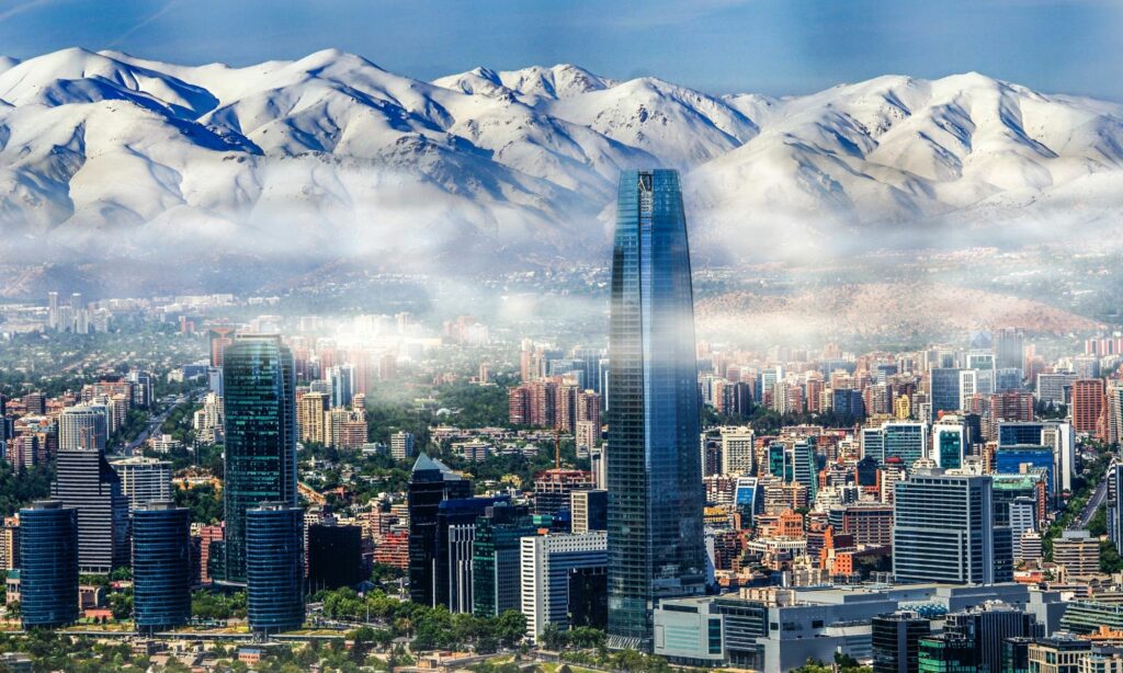 Santiago cityscape wrapped by snowy Andes Mountains