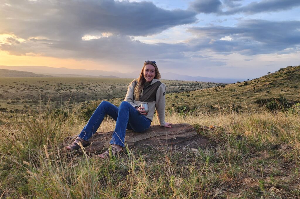 Abby, our safari specialist, enjoying a drink at the Lewa Conservancy in Kenya