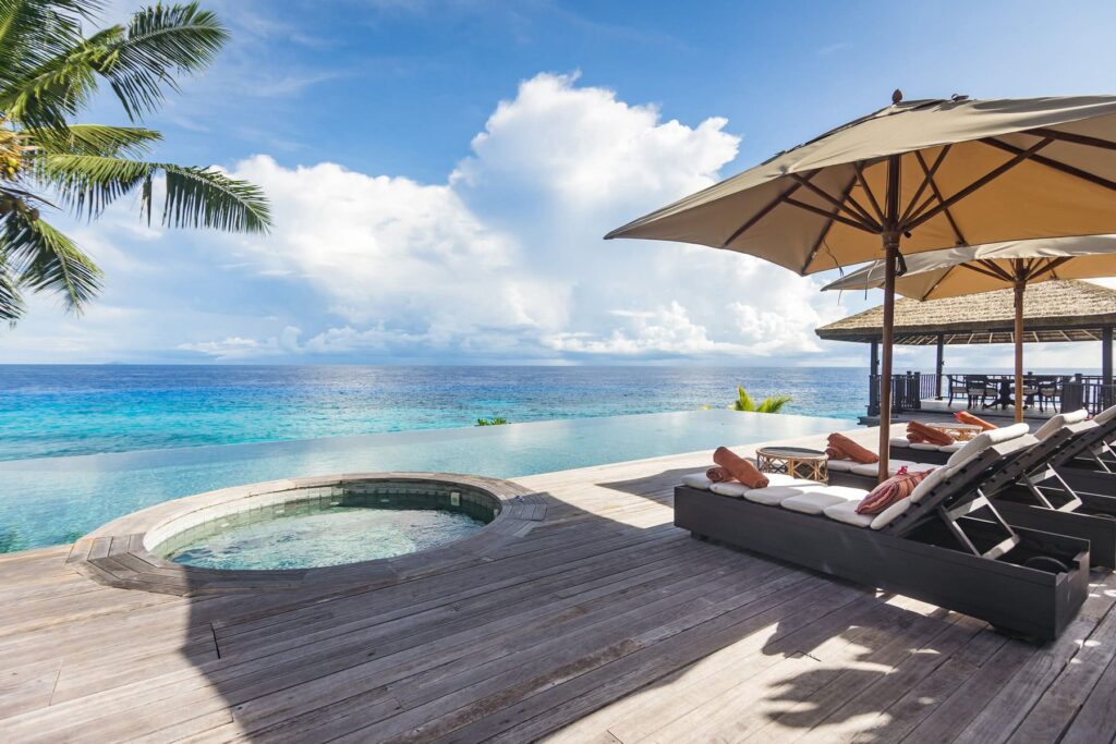 Private beach resort on Fregate Island, offering exclusive fishing and spa experiences, a prime Seychelles beach resort destination set to welcome guests in 2025.