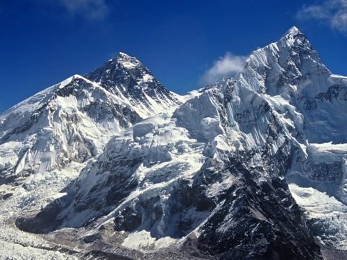 on this Nepal holiday you can view Mt. Everest and the surrounding mountains against a bright blue sky