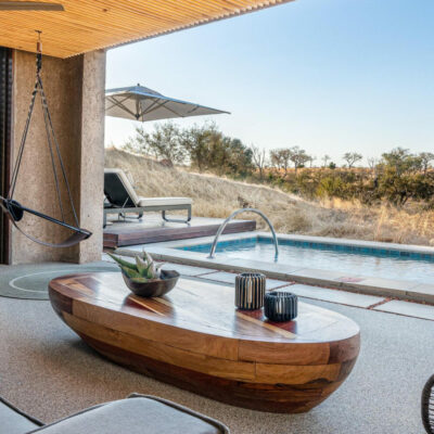 The sleek Luxury Suite at Sabi Sabi Earth Lodge blends bespoke decor with the elements of nature.